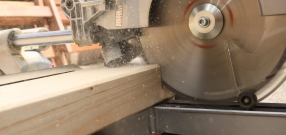close-up-circular-saw-cutting-wood